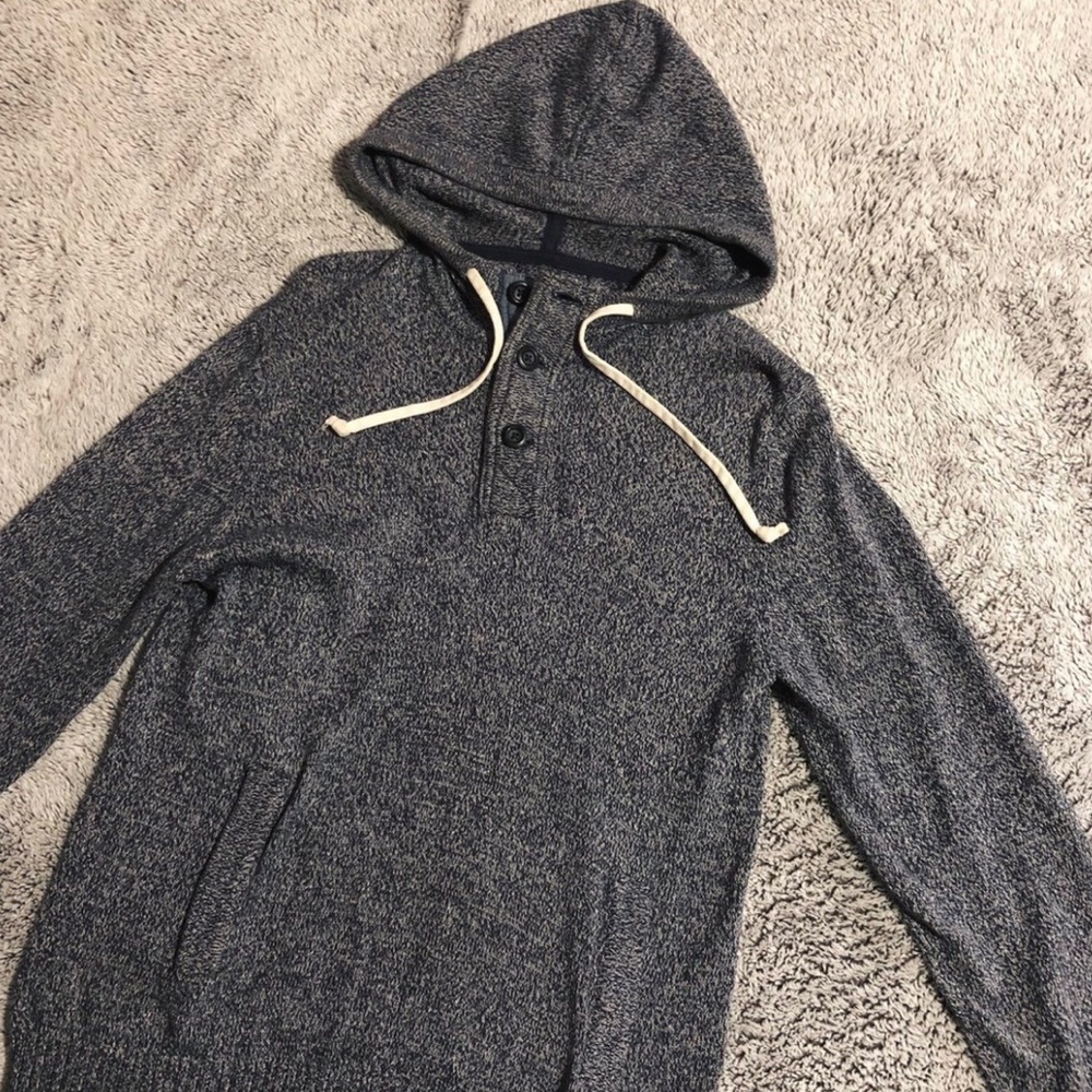 Gray sweater with a hoodie